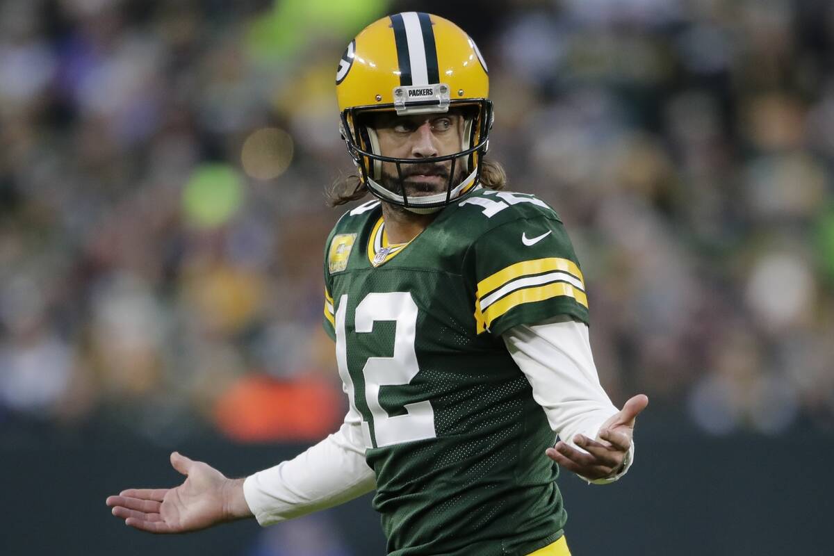 Green Bay Packers' Aaron Rodgers reacts after an incomplete pass during the first half of an NF ...