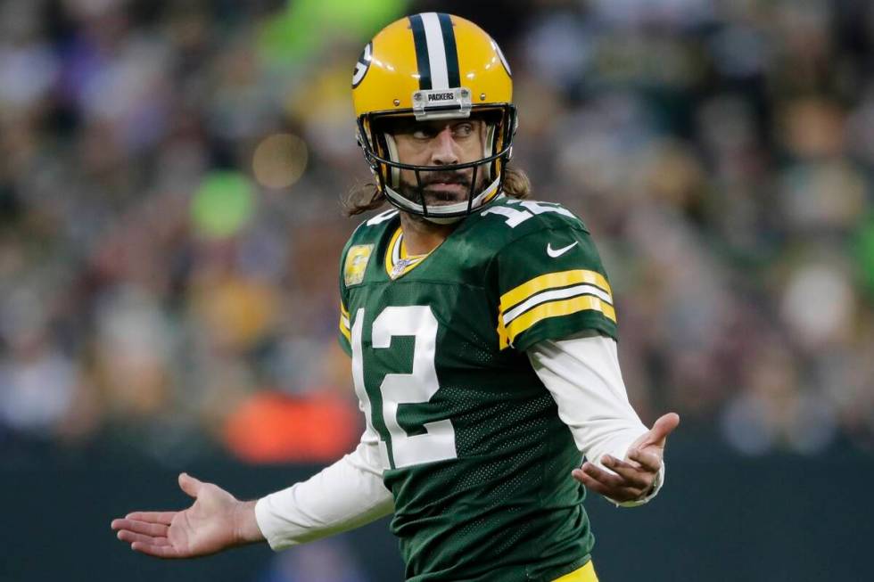 Green Bay Packers' Aaron Rodgers reacts after an incomplete pass during the first half of an NF ...