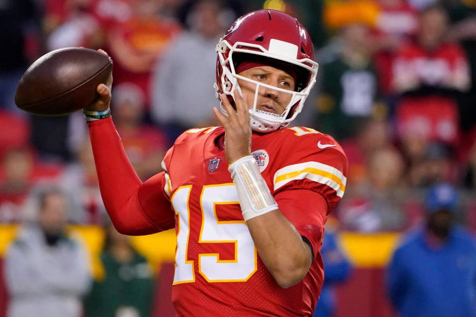 Kansas City Chiefs quarterback Patrick Mahomes throws during the second half of an NFL football ...