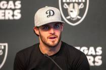 Raiders quarterback Derek Carr (4) answers questions during a news conference at Raiders headqu ...