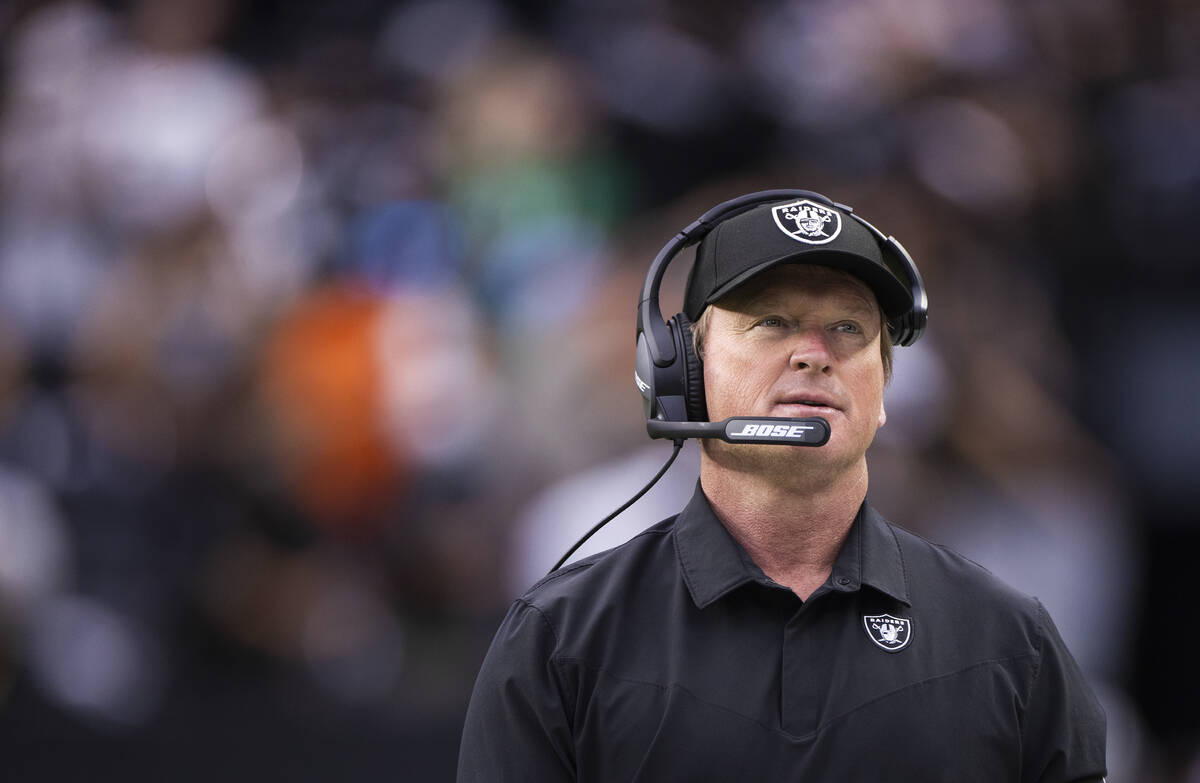 Raiders head coach Jon Gruden walks the sideline during an NFL football game against the Chicag ...