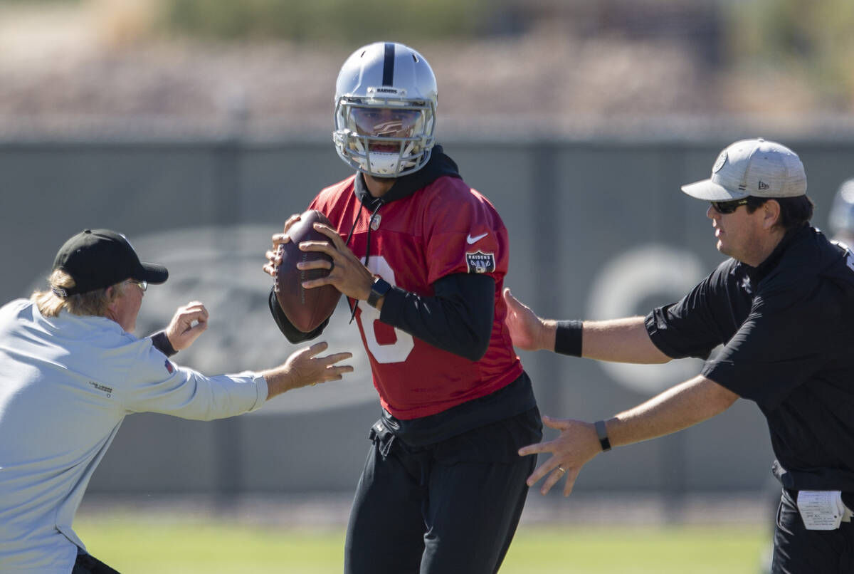 Raiders quarterback Marcus Mariota (8) works through a drill during a practice session at the R ...
