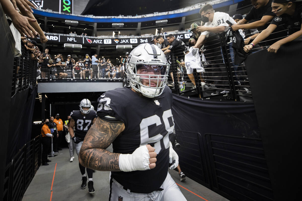 Las Vegas Raiders center Andre James (68) takes the field before the start of an NFL football g ...