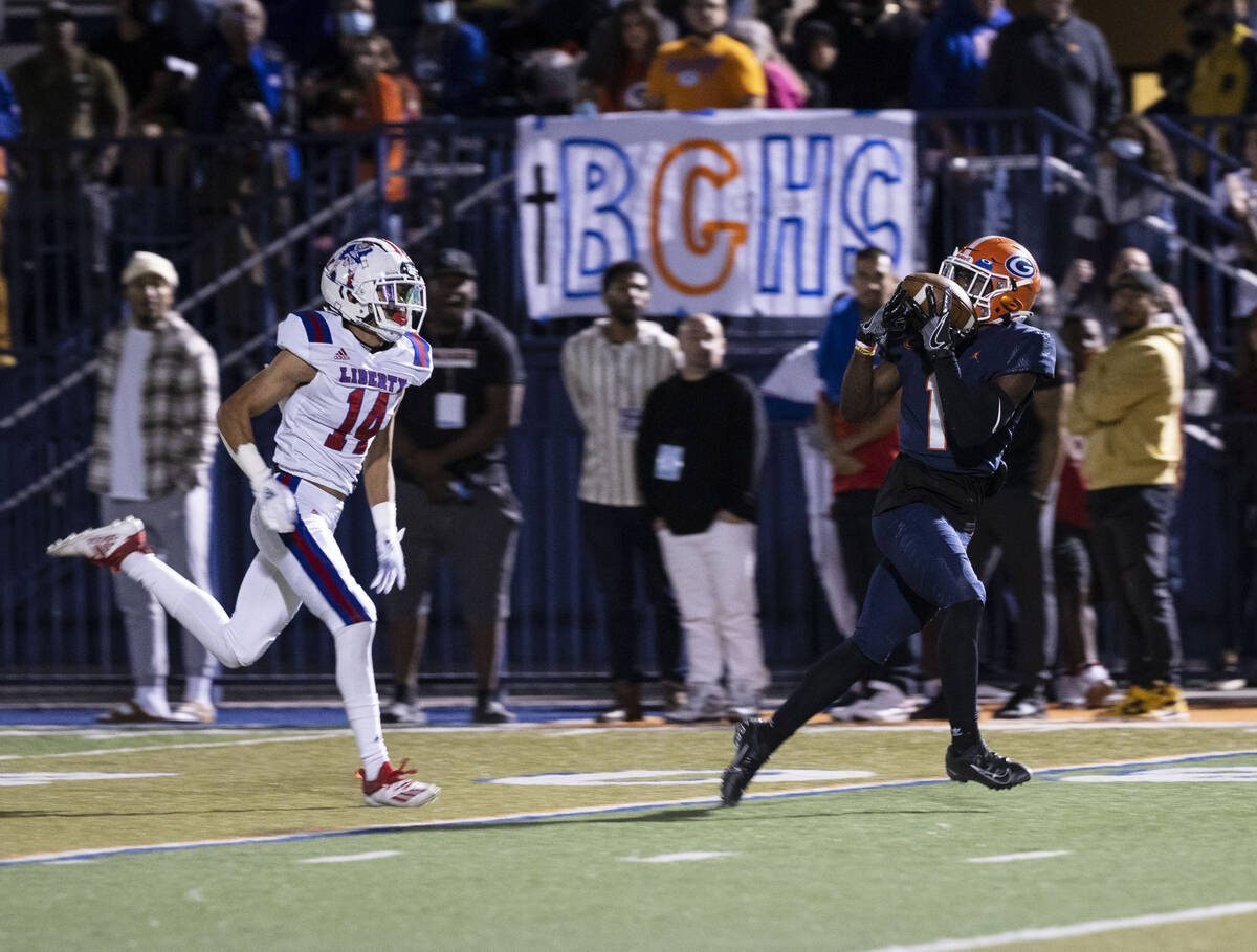 Bishop Gorman’s wide receiver Zachariah Branch (1) catches a touchdown pass as Liberty ...