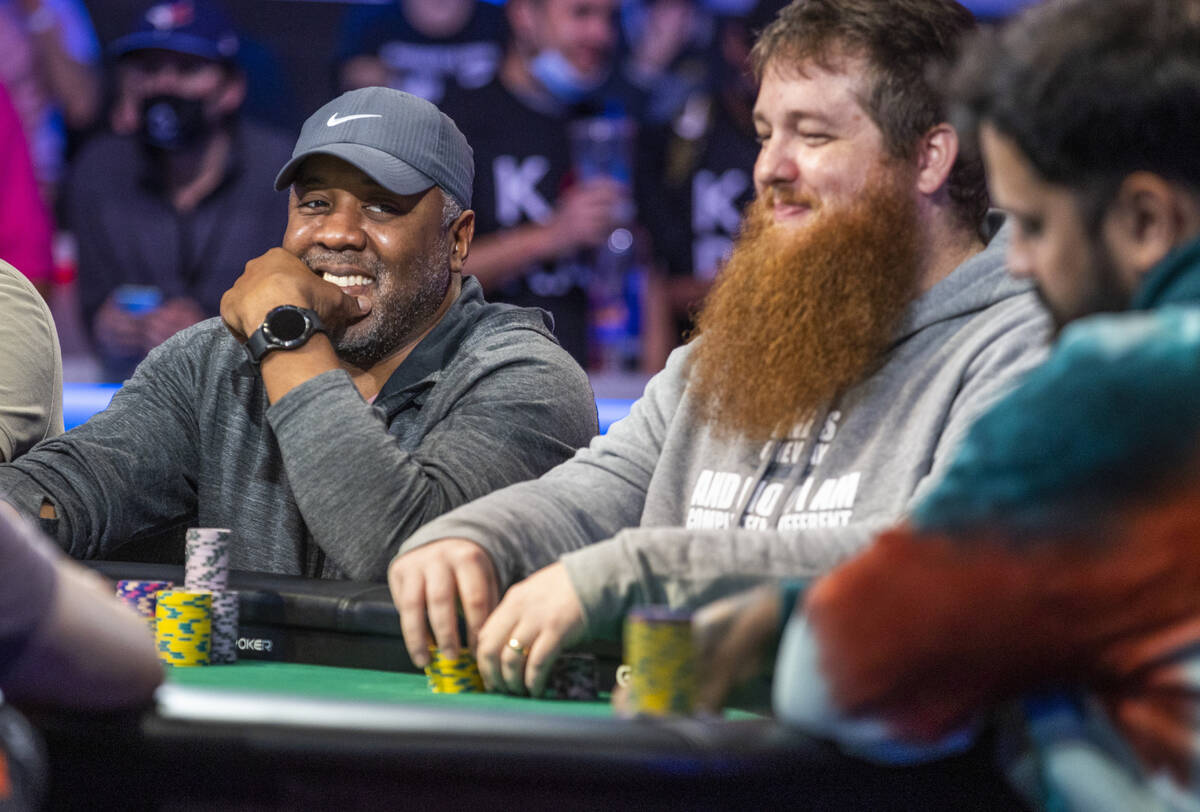 George Holmes, left, Chase Bianchi, center, and Alejandro Lococo have fun at the final table fo ...