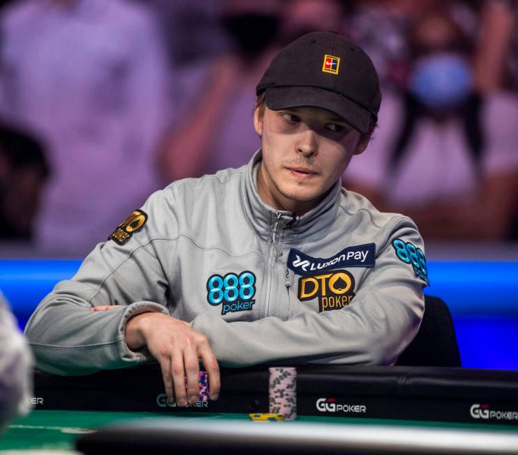 Jack Oliver considers betting a stack with three players remaining at the final table for the $ ...