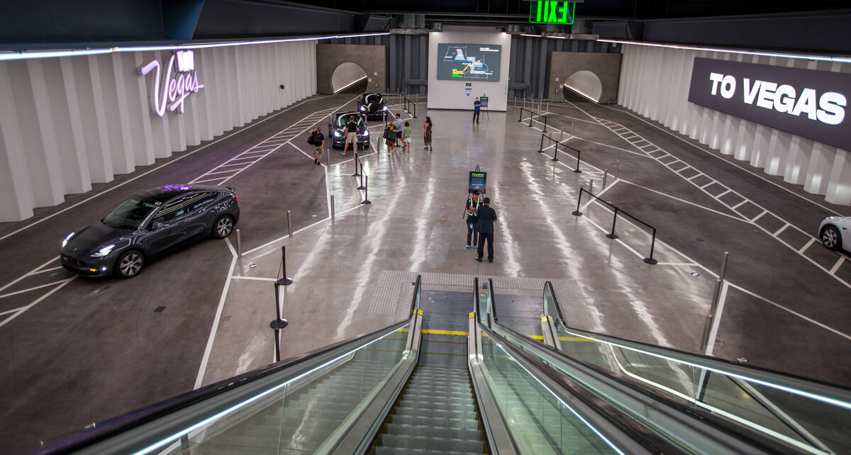 Teslas arrive and depart the Central Hall stop in the Boring Company's Convention Center Loop W ...