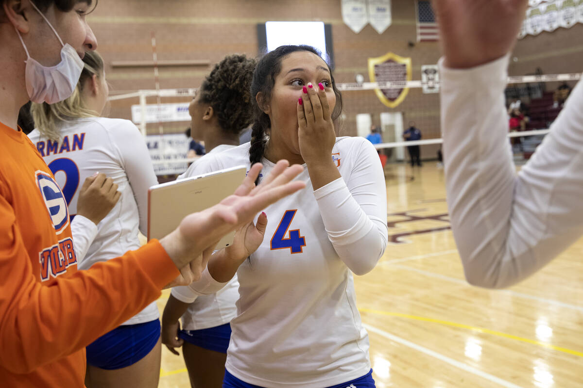 Bishop Gorman's Brooklyn Samuel (4) reacts as the team wins the Class 5A state volleyball champ ...