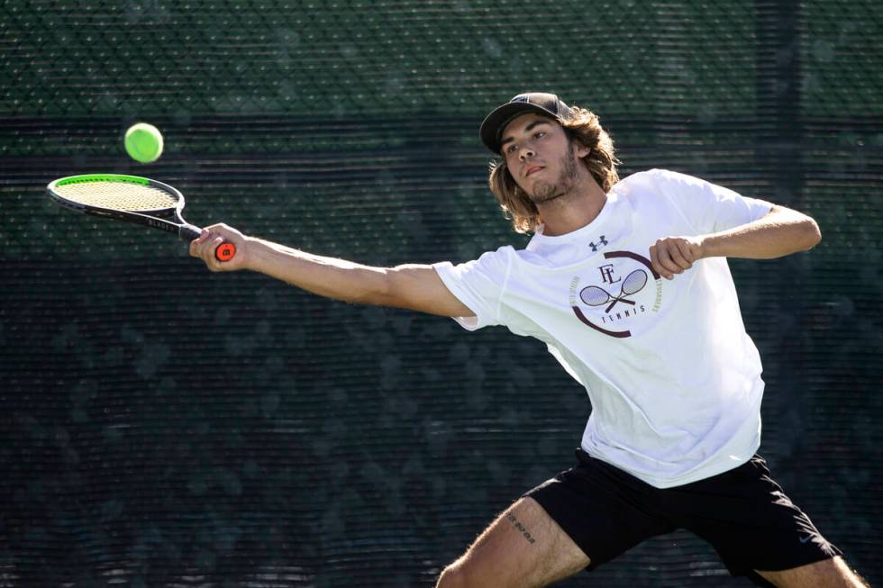 Faith Lutheran's Nicco Ripamonti hits to Reno during as boys double class 5A championship match ...