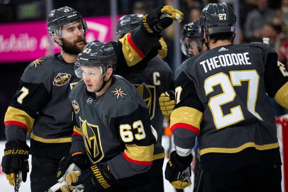 Golden Knights right wing Evgenii Dadonov (63) leaves the huddle after scoring a goal during th ...