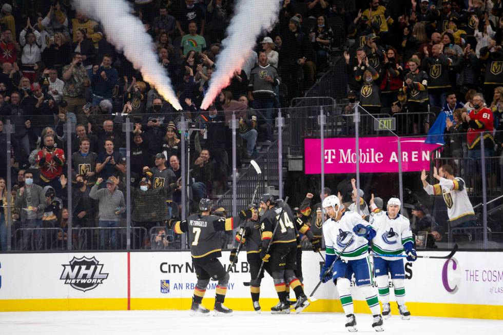 The Golden Knights celebrate after right wing Reilly Smith (19) scored a goal during the second ...