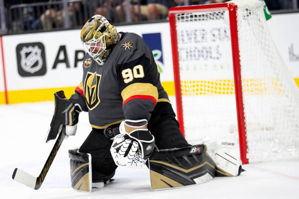 Golden Knights goaltender Robin Lehner (90) saves a shot on goal during the second period of a ...