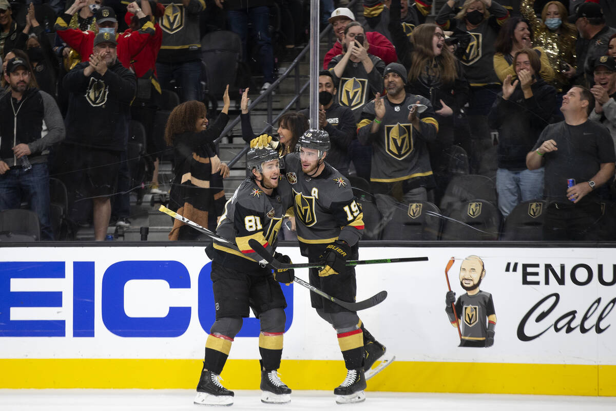 Golden Knights center Jonathan Marchessault (81) and right wing Reilly Smith (19) celebrate a g ...