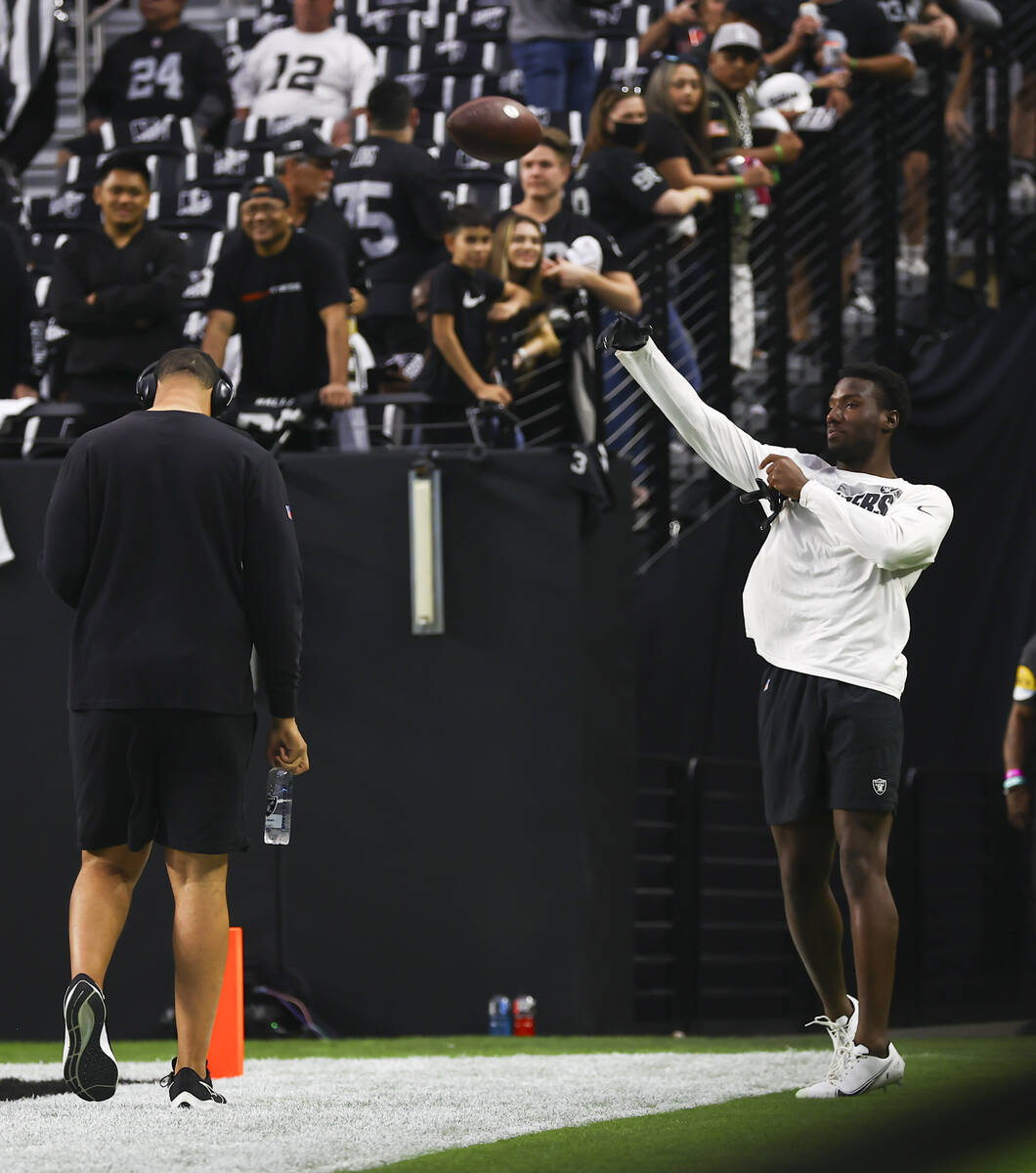 Raiders wide receiver Bryan Edwards warms up before the start of an NFL game against the Kansas ...