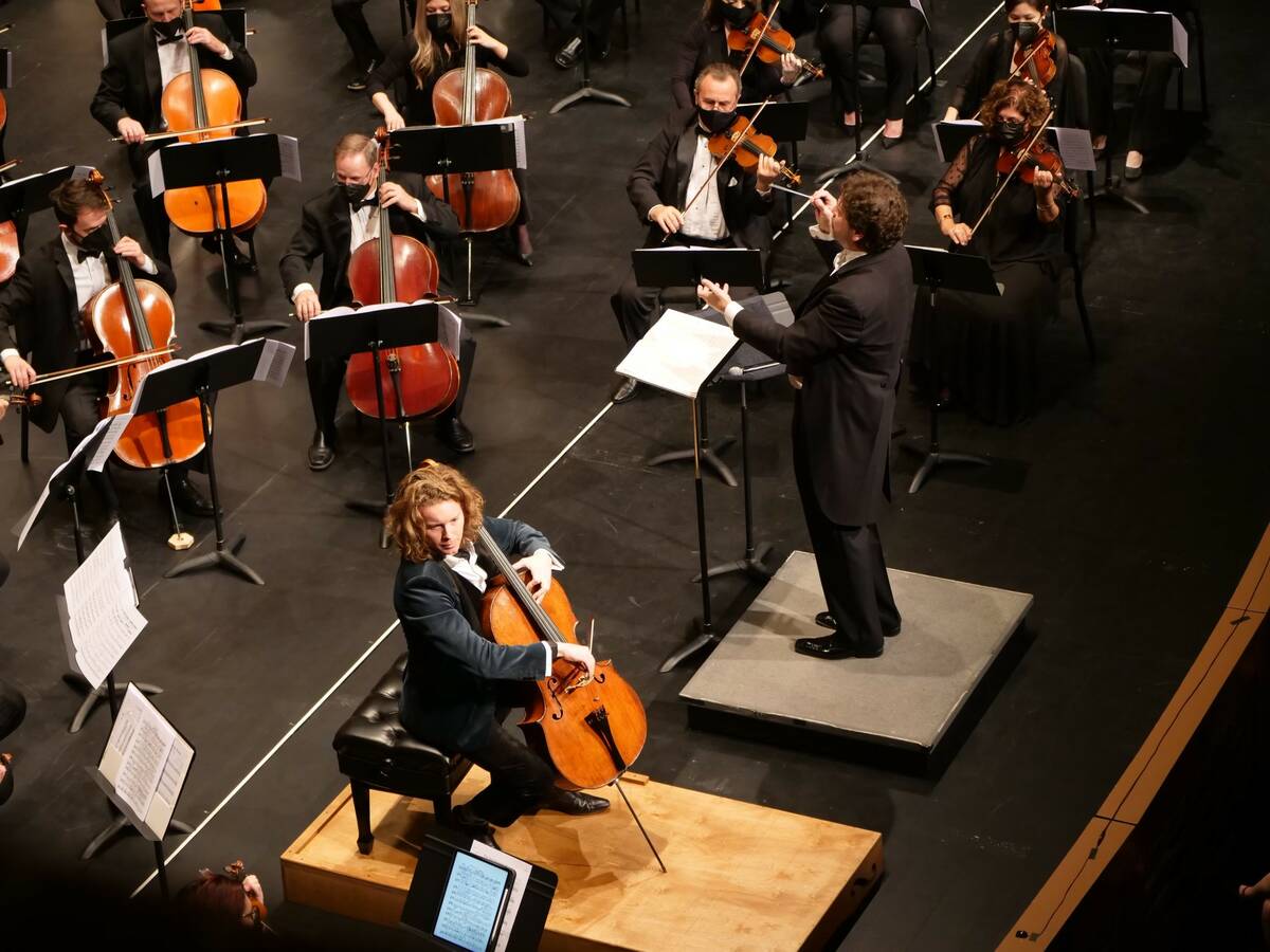 Las Vegas Philharmonic artist-in-residence Joshua Roman is shown with conductor Donato Cabrera ...