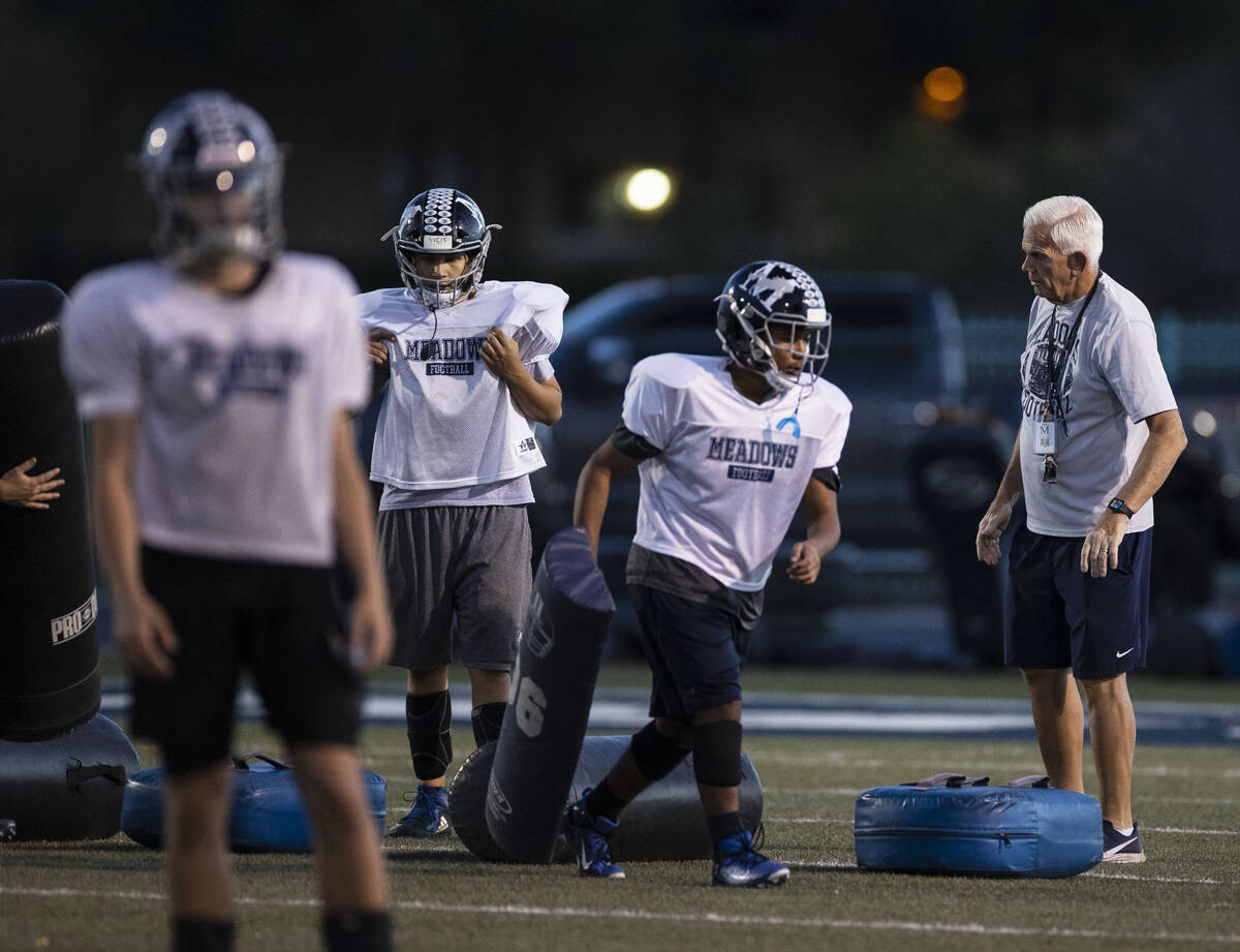 The Meadows High School football head coach Jack Concannon watches his players during practice, ...