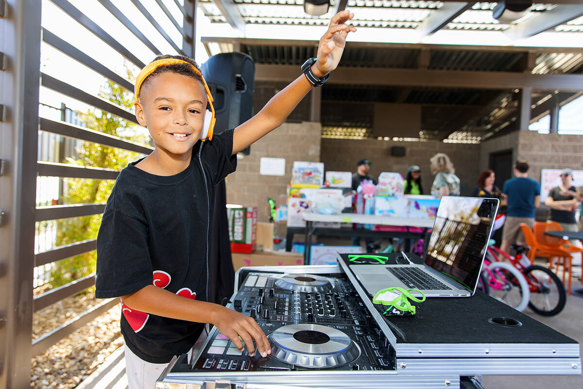 Tri Pointe Homes DJ Jace, 10, donated his services at a recent Inspirada toy drive hosted by T ...
