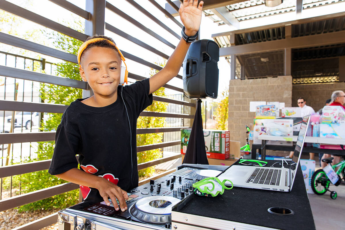 DJ Jace, 10, donated his services at a recent Inspirada toy drive hosted by Tri Pointe Homes. T ...