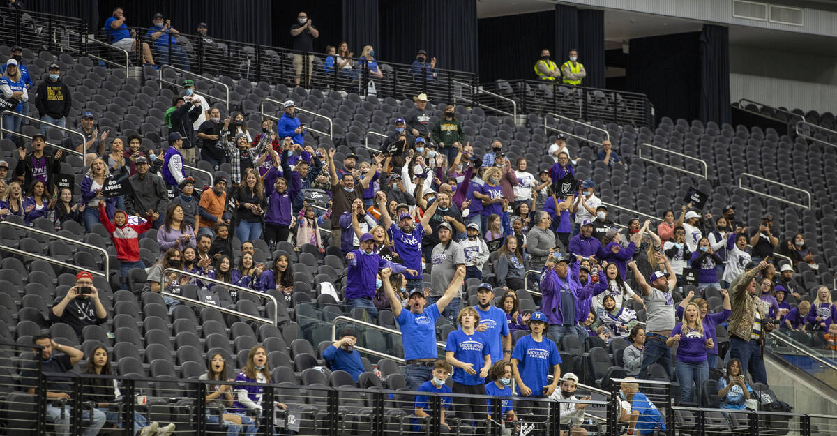 Yerington fans cheer another score over The Meadows during the second half of their Class 2A fo ...