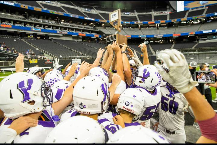 Yerington players celebrate their win over The Meadows following the second half of their Class ...