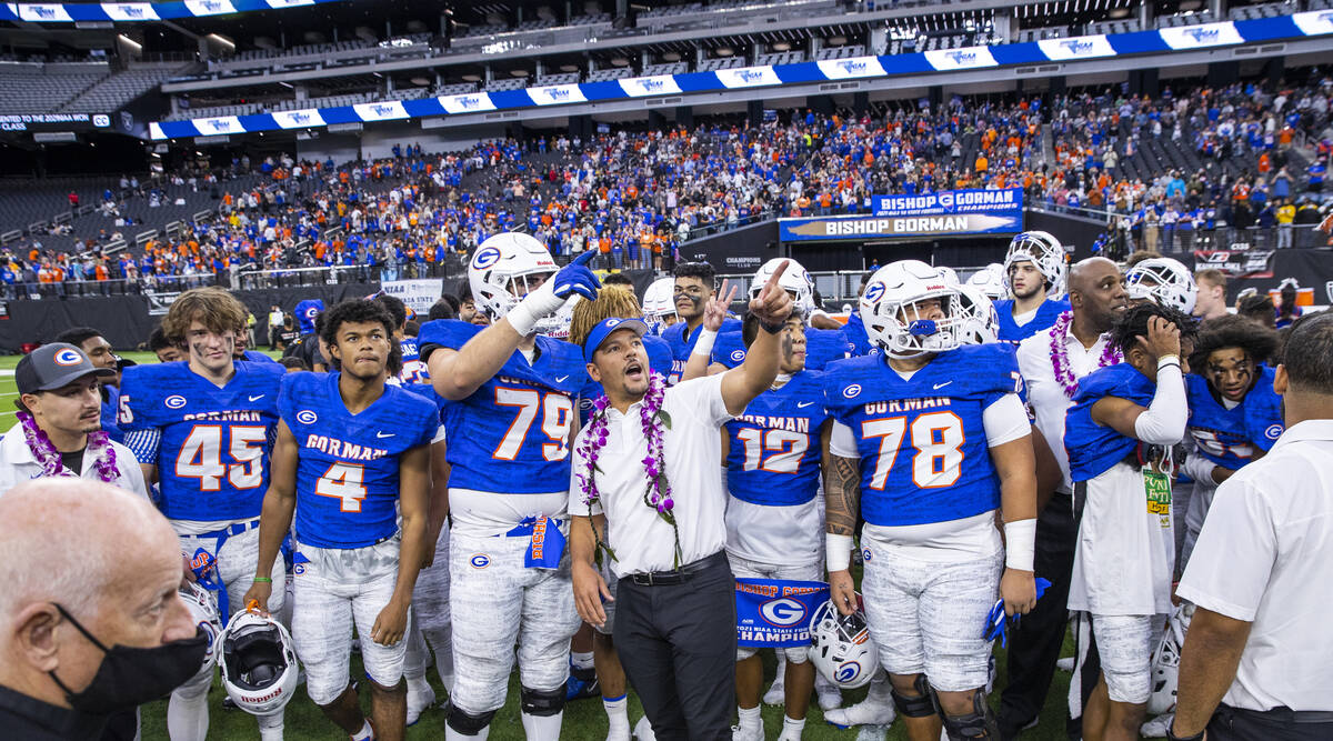 Bishop Gorman head coach Brent Browner with his team after defeating McQueen 56-7 following the ...