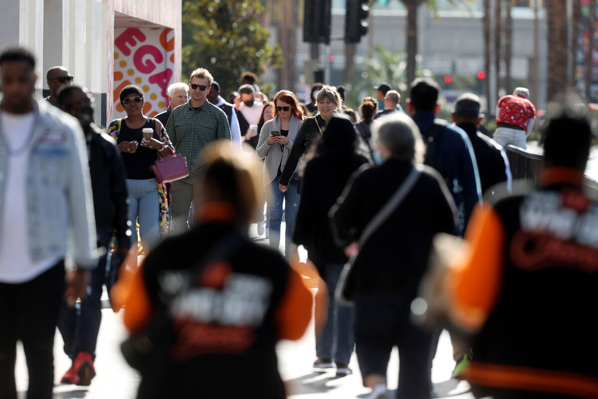 People walk past The Linq Hotel on the Strip in Las Vegas Monday, Nov. 22, 2021. (K.M. Cannon/L ...