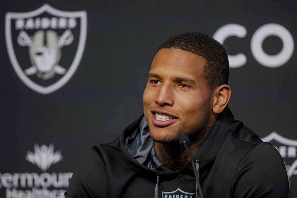 Raiders tight end Darren Waller smiles during a news conference at Raiders headquarters at the ...