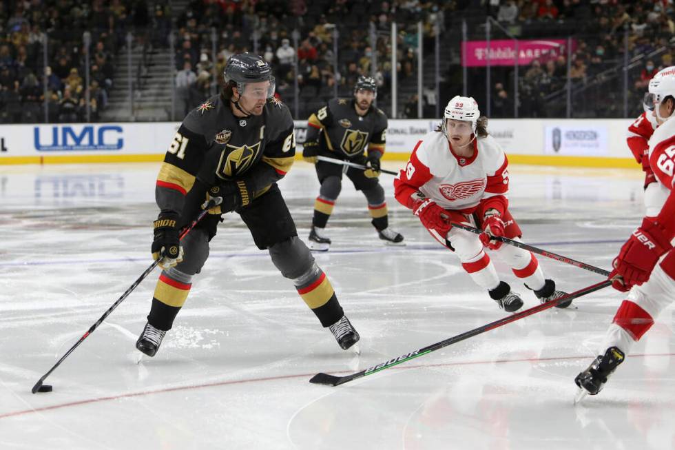 Vegas Golden Knights right wing Mark Stone (61) looks for the open pass against the Detroit Red ...