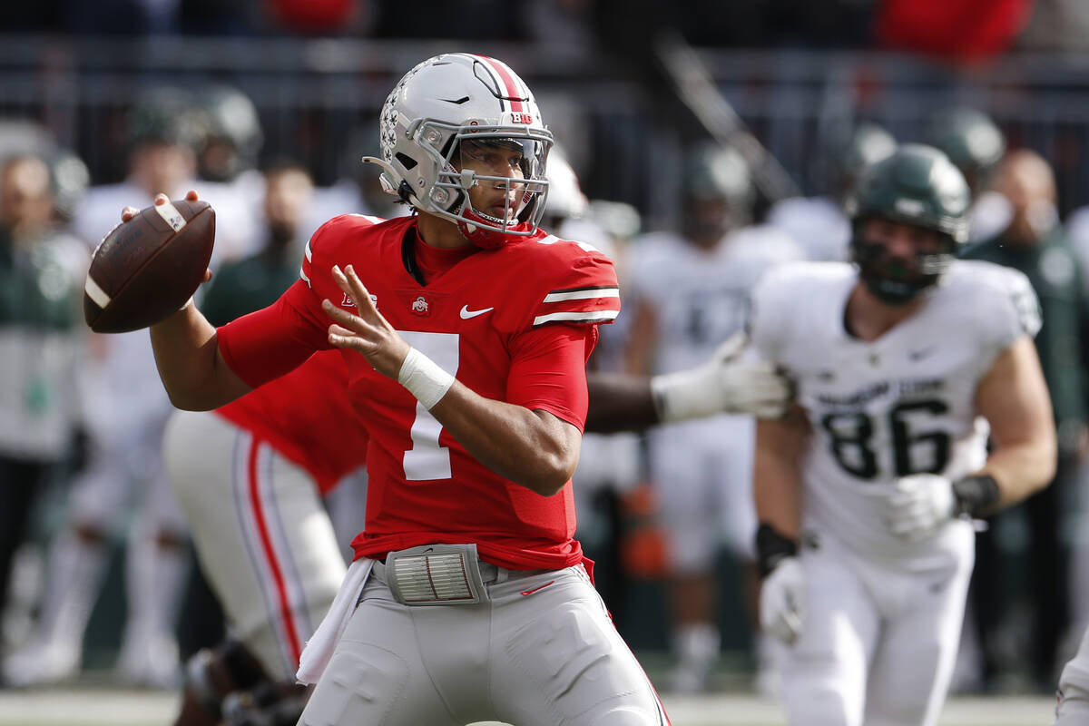 Ohio State quarterback C.J. Stroud drops back to pass against Michigan State during the first h ...
