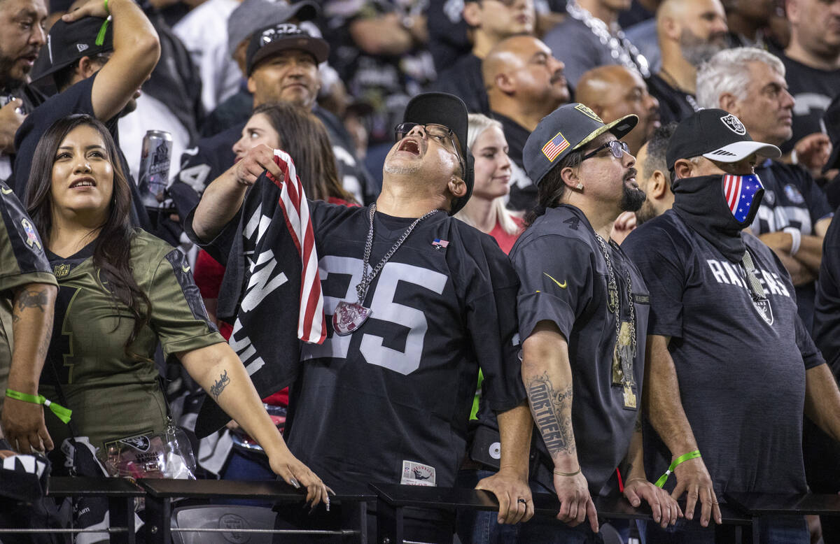 Raiders fans are dejected after another Kansas City Chiefs score during the second half of an N ...