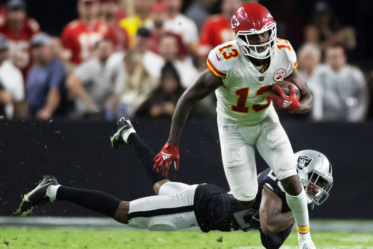 Kansas City Chiefs wide receiver Byron Pringle (13) breaks free from Raiders cornerback Casey H ...