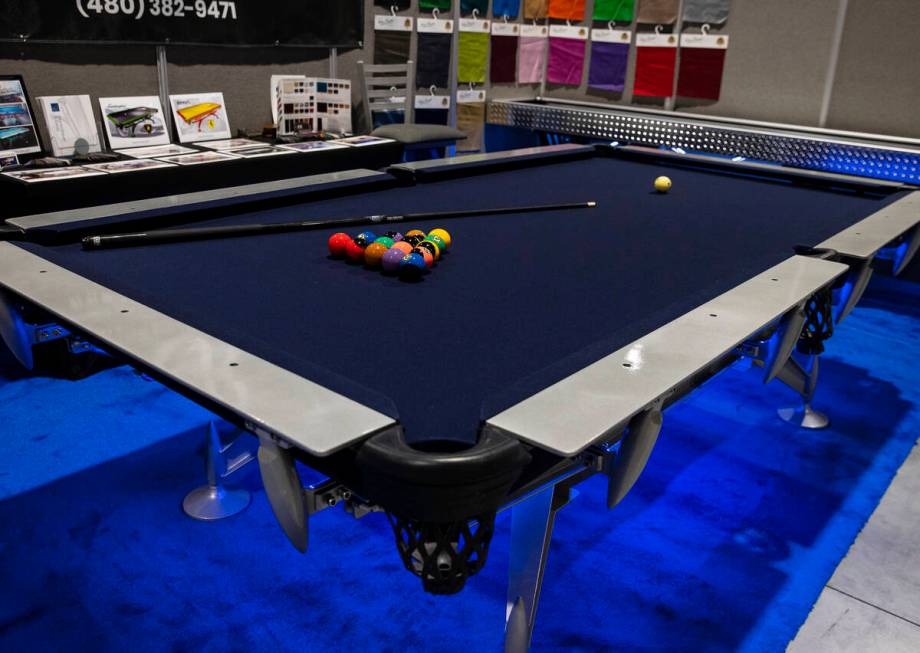 A professional pool table made by Martin Bauer Billiards is displayed at Big Boys Toys, the wor ...