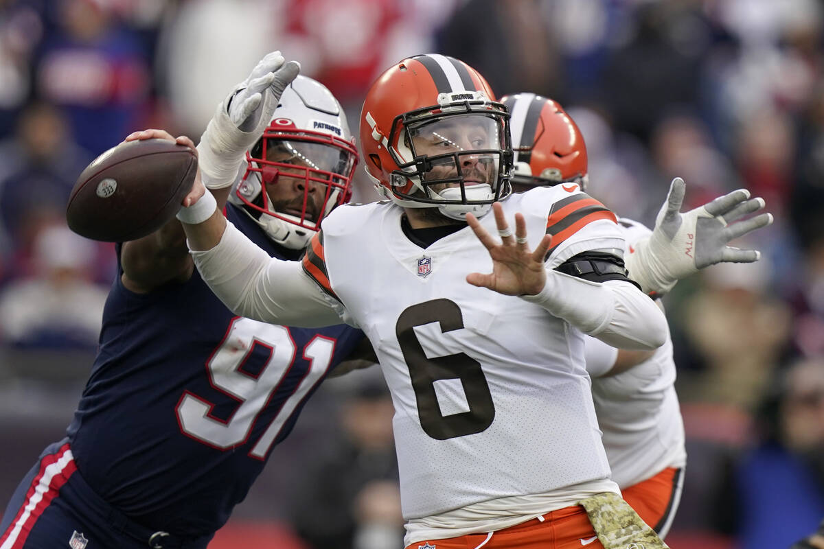New England Patriots defensive end Deatrich Wise (91) pounces on Cleveland Browns quarterback B ...