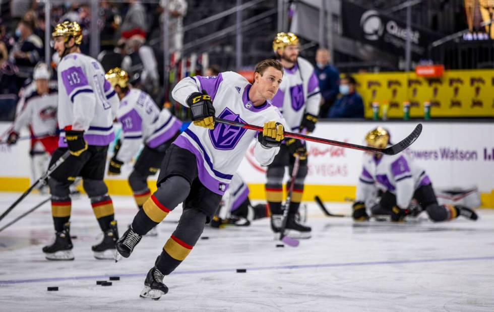 Golden Knights center Ben Jones (4) warms up before the first period of an NHL game at T-Mobile ...