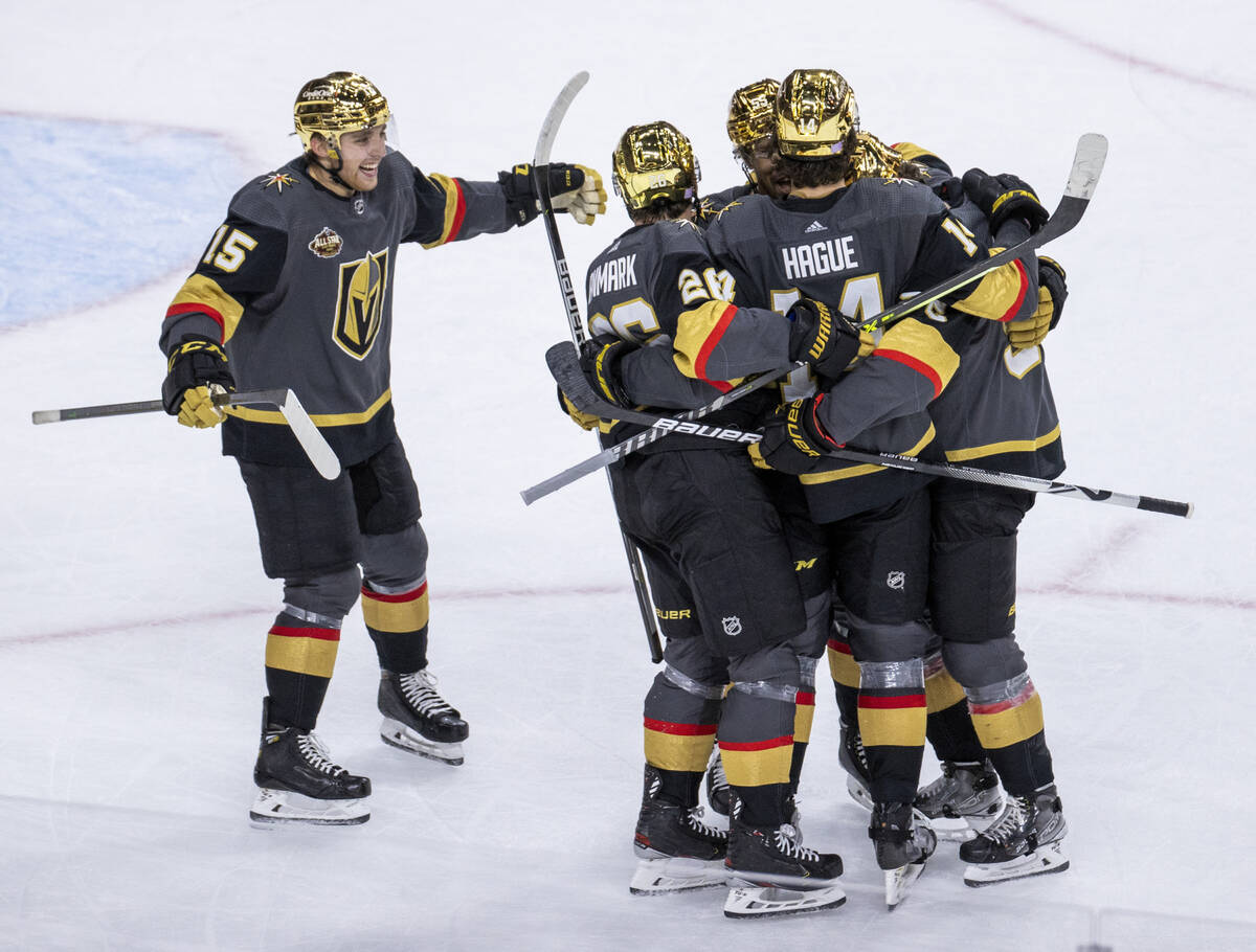 Golden Knights center Mattias Janmark (26) sends the puck into the net past Columbus Blue Jacke ...