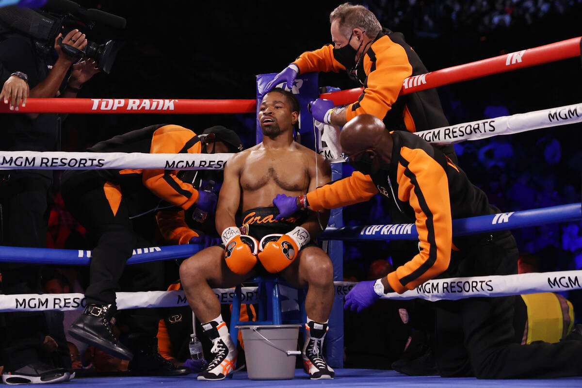 Shawn Porter sits at this corner after the second round in the WBO welterweight title fight aga ...