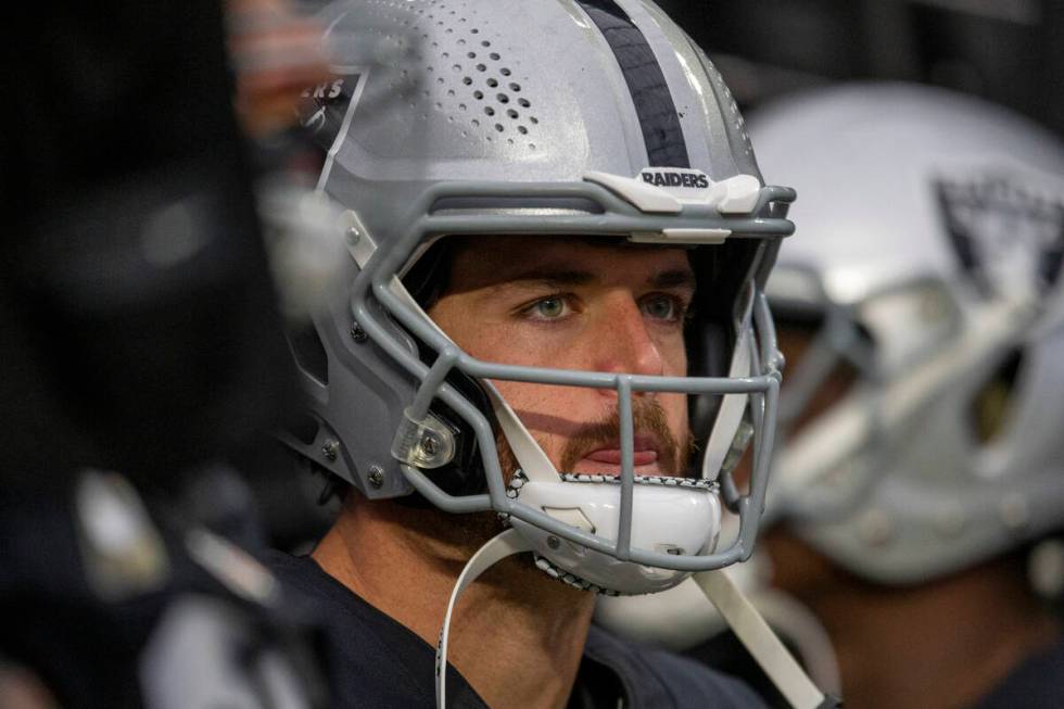 Raiders quarterback Derek Carr (4) waits in the tunnel to take the field before an NFL football ...