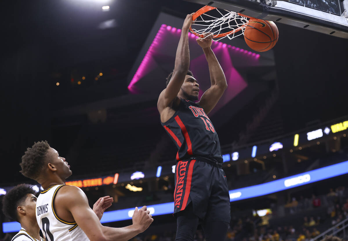 UNLV Rebels guard Bryce Hamilton (13) dunks the ball against Wichita State during the first hal ...