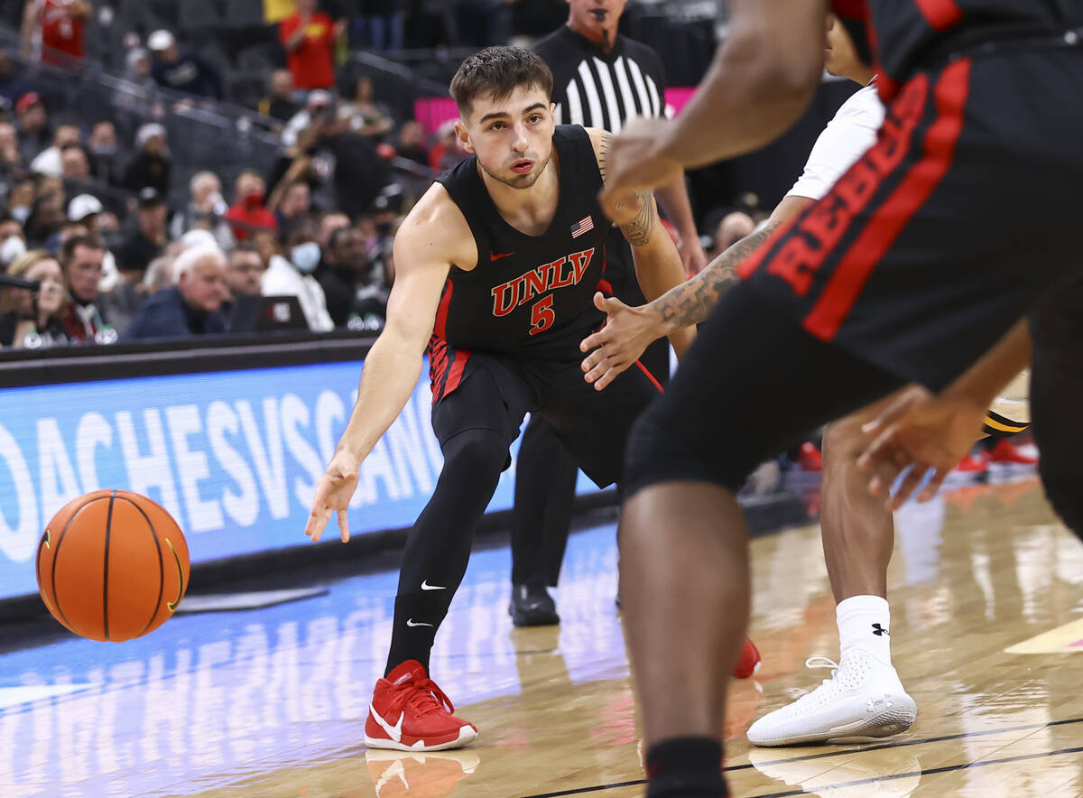 UNLV Rebels guard Jordan McCabe (5) passes the ball during the first half of the Roman Main Eve ...