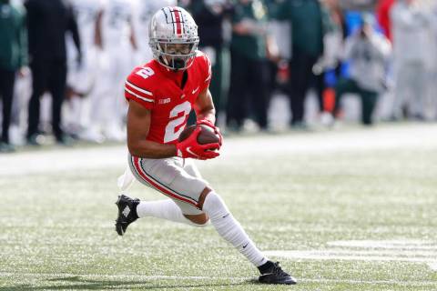 Ohio State receiver Chris Olave plays against Michigan State during an NCAA college football ga ...