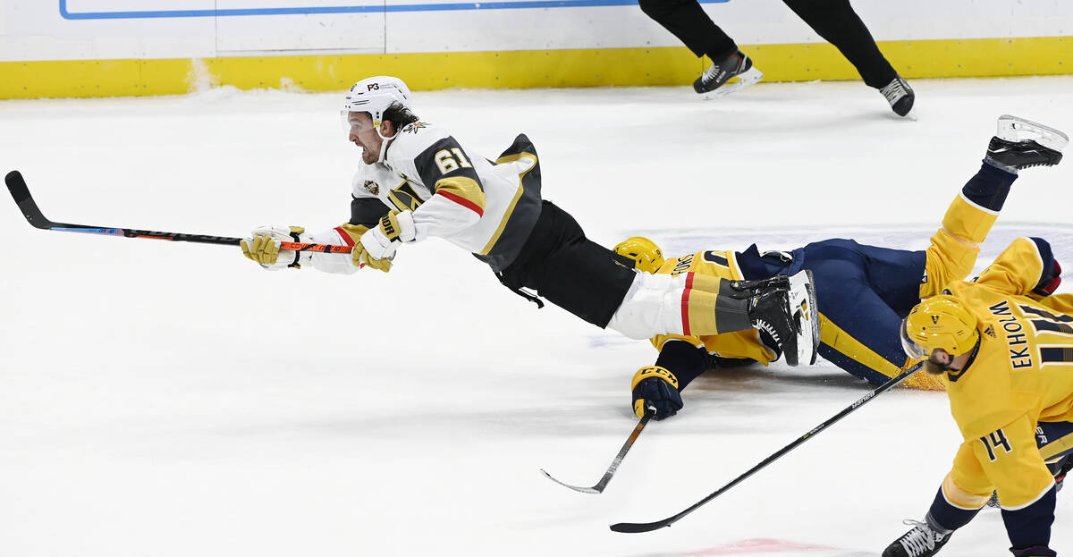 Vegas Golden Knights right wing Mark Stone (61) watches his shot go in for an empty-net goal as ...