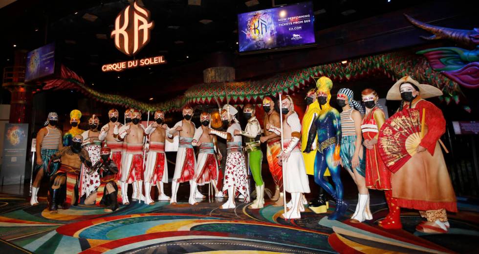 Cirque Du Soleil's KÀ artists pose for a photo in front of the theater before the production's ...