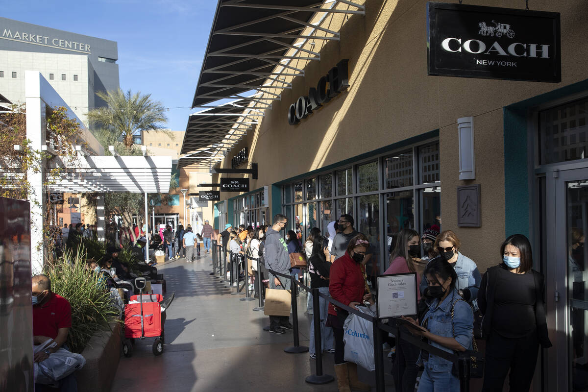 Customers wait in line at Coach during Black Friday shopping at the Las Vegas North Premium Out ...