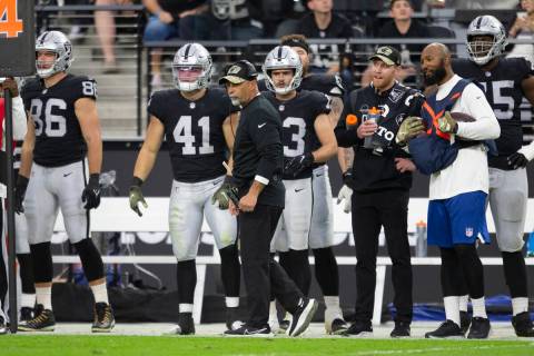 Raiders interim head coach Rich Bisaccia walks the sideline during the fourth quarter of an NFL ...