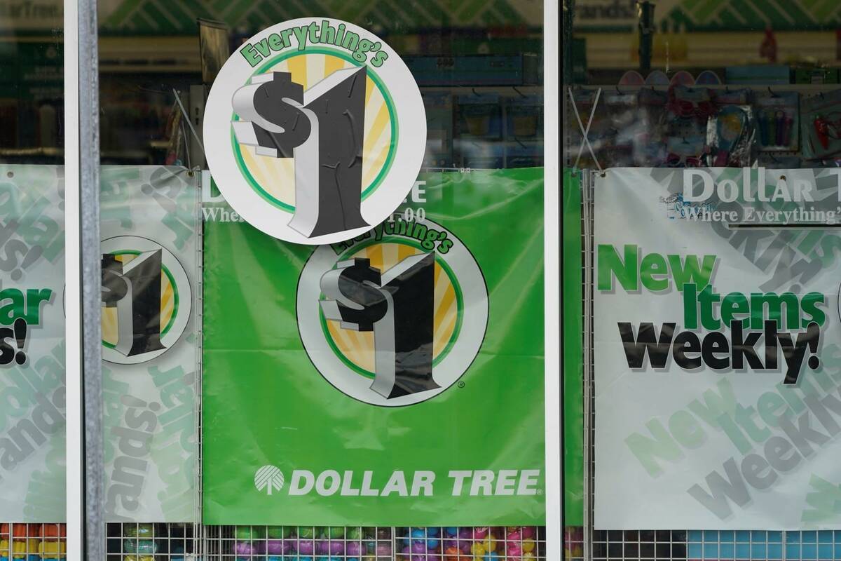 Dollar Tree store logos indicating that everything in the store is for $1 are promoted on a sto ...