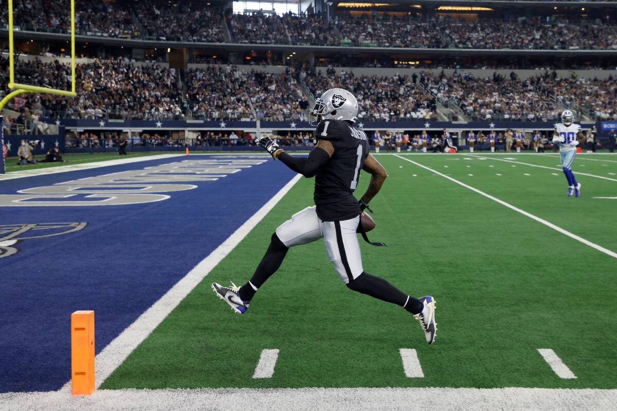 Las Vegas Raiders wide receiver DeSean Jackson sprints to the end zone after catching a pass fo ...