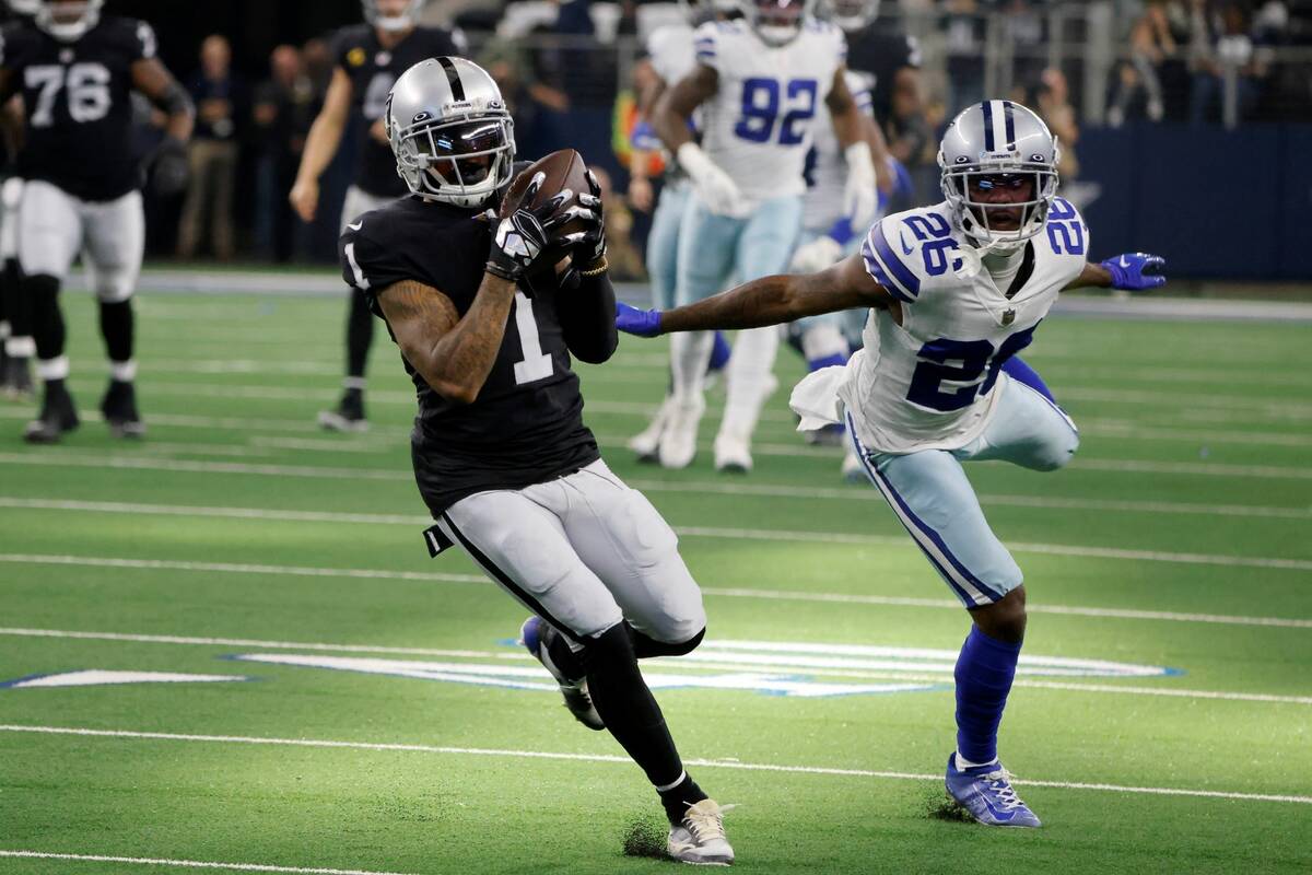 Las Vegas Raiders wide receiver DeSean Jackson (1) catches a pass for a touchdown as Dallas Cow ...