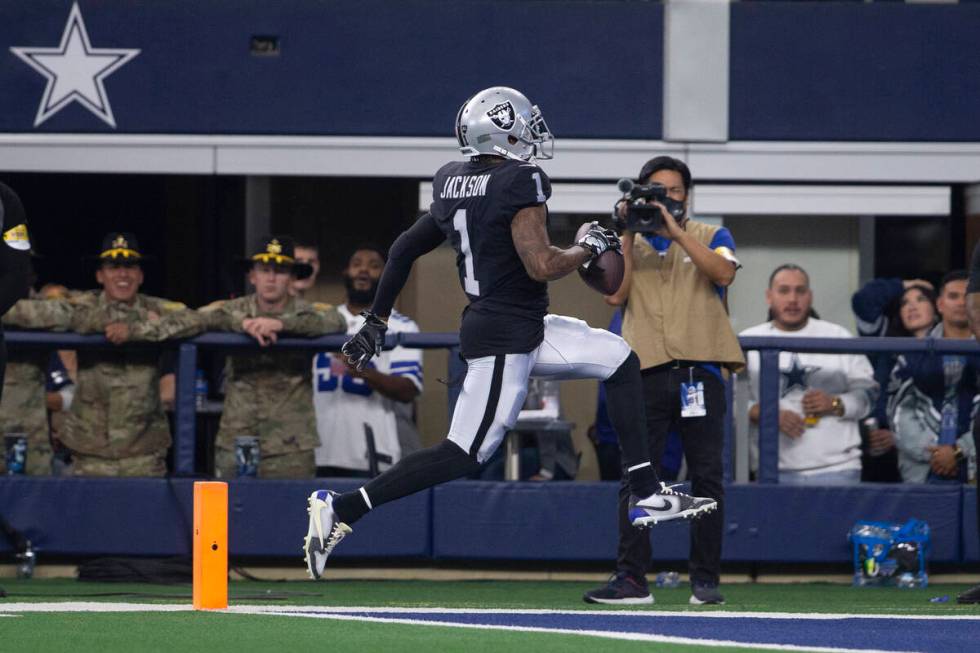 Raiders wide receiver DeSean Jackson (1) runs in for a touchdown during the first quarter of an ...