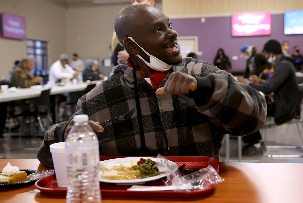 Ken Reed, 50, eats a free Thanksgiving meal in the renovated St. Vincent Lied Dining Facility a ...