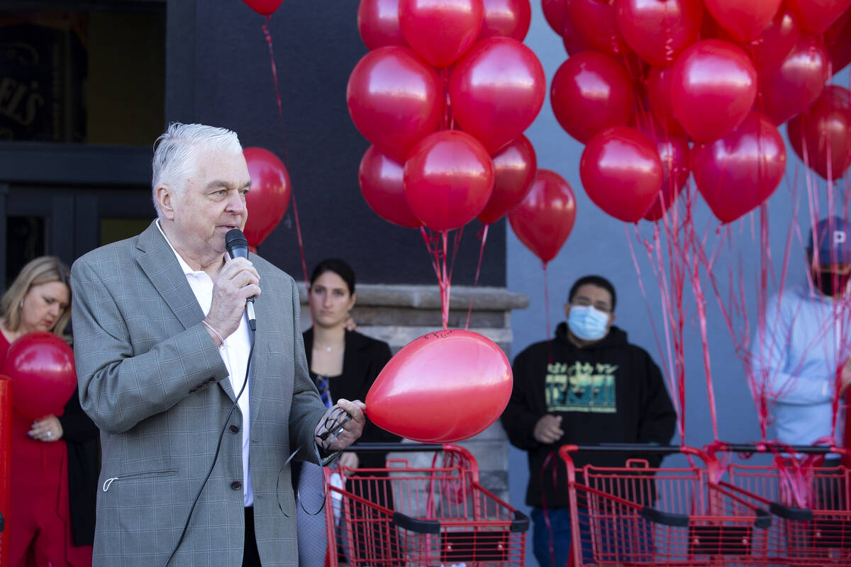 Gov. Steve Sisolak speaks during a vigil to the late Kenny Lee, the heir to Leeճ Discount ...